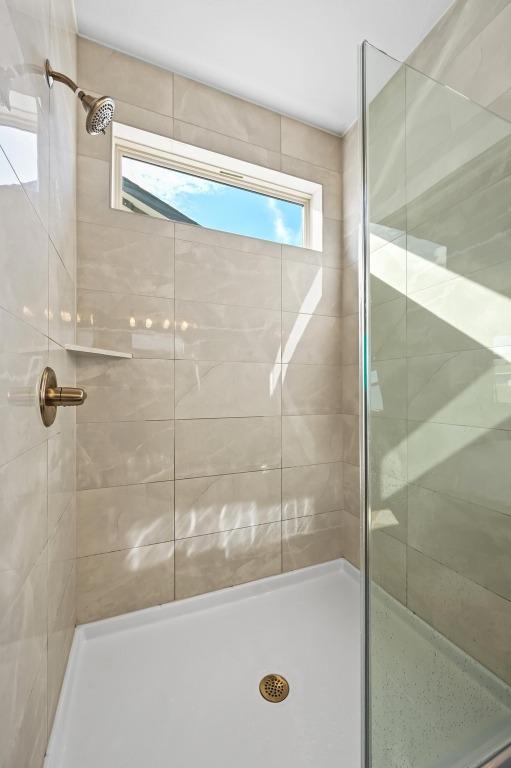 8513 Cottage Rose Dr, Austin, TX 78744 - full bath with a shower stall