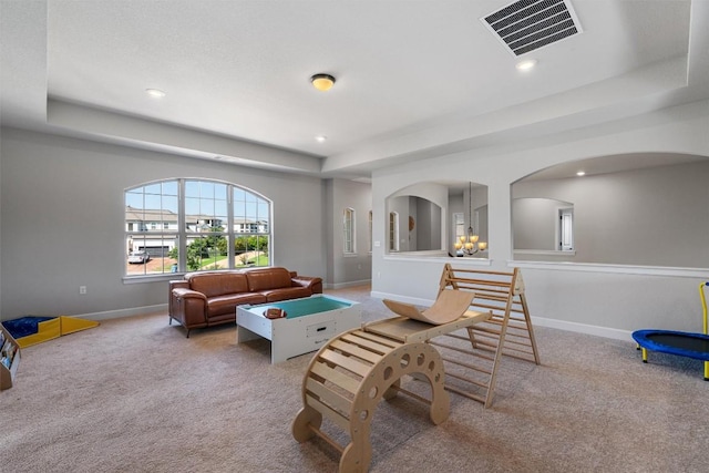 413 Mercer Falls Rd, Lakeway, TX 78738 - living area with carpet flooring, a raised ceiling, baseboards, and recessed lighting