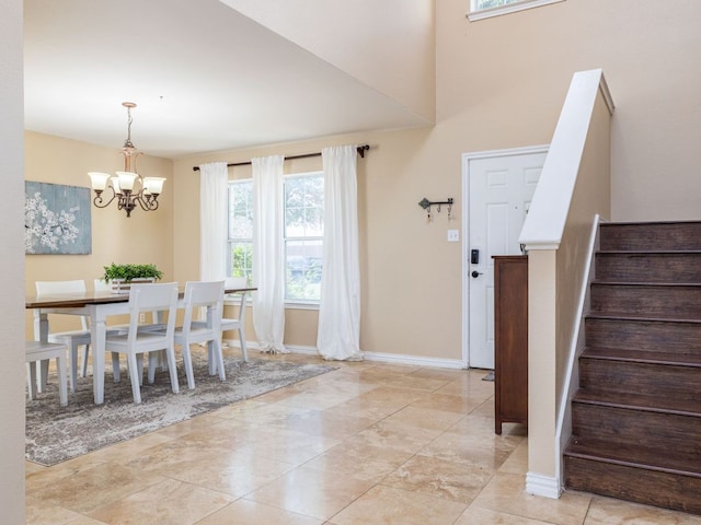 235 Herrera Trl, Hutto, TX 78634 - dining space with a chandelier, stairs, and baseboards