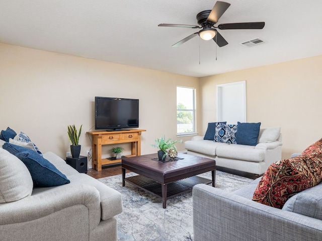 235 Herrera Trl, Hutto, TX 78634 - living area featuring ceiling fan and wood finished floors