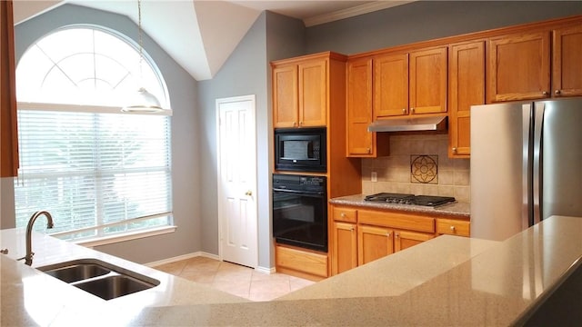 12828 Withers Way, Austin, TX 78727 - kitchen with black appliances, under cabinet range hood, a sink, backsplash, and light tile patterned flooring