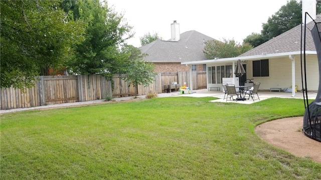 12828 Withers Way, Austin, TX 78727 - view of yard with a patio area