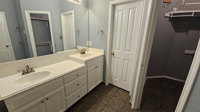 12828 Withers Way, Austin, TX 78727 - bathroom featuring double vanity