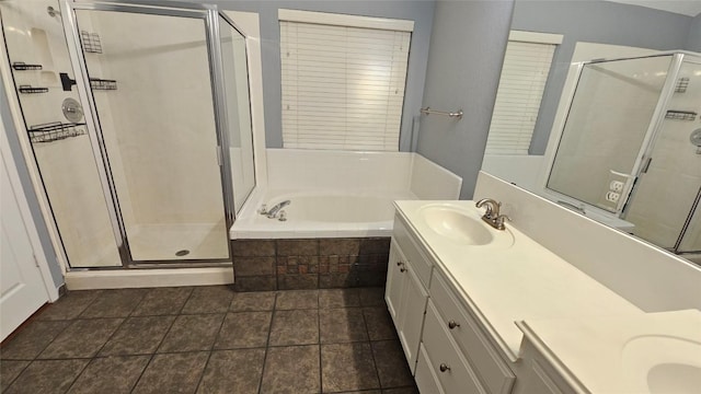 12828 Withers Way, Austin, TX 78727 - bathroom featuring double vanity, a shower stall, and a bath