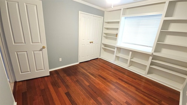 12828 Withers Way, Austin, TX 78727 - unfurnished bedroom with ornamental molding, dark wood-style flooring, and a closet