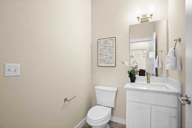 8945 Parker Ranch Cir Unit B, Austin, TX 78748 - half bathroom with toilet, vanity, and baseboards