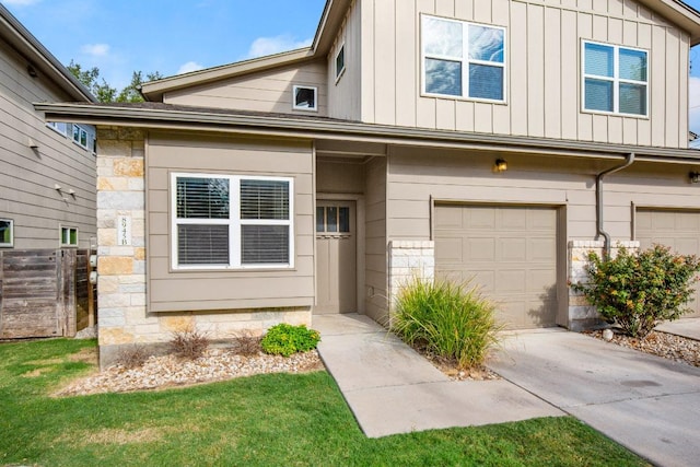 8945 Parker Ranch Cir Unit B, Austin, TX 78748 - multi unit property featuring board and batten siding, a garage, stone siding, and concrete driveway