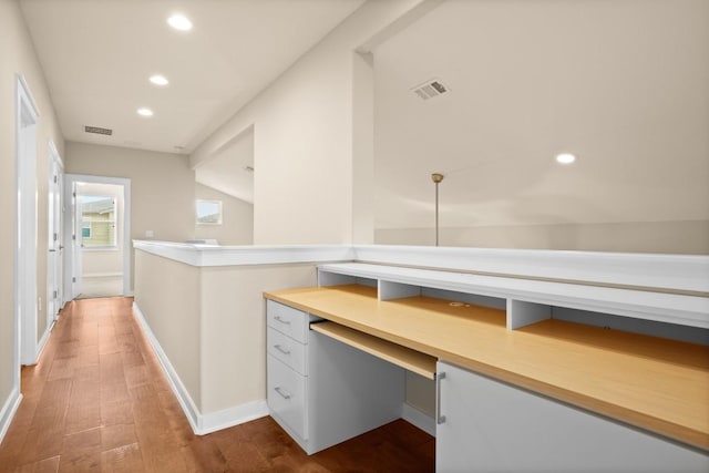 8945 Parker Ranch Cir Unit B, Austin, TX 78748 - corridor featuring recessed lighting, an office area, wood finished floors, and baseboards