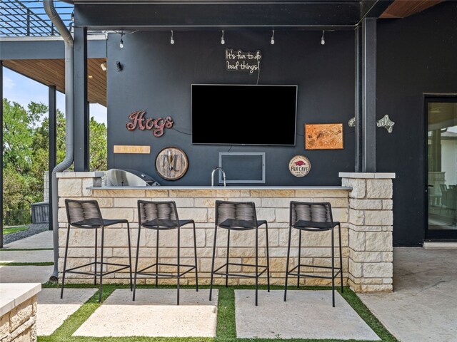 6037 Verandero Ct, Austin, TX 78738 - view of patio / terrace with exterior kitchen