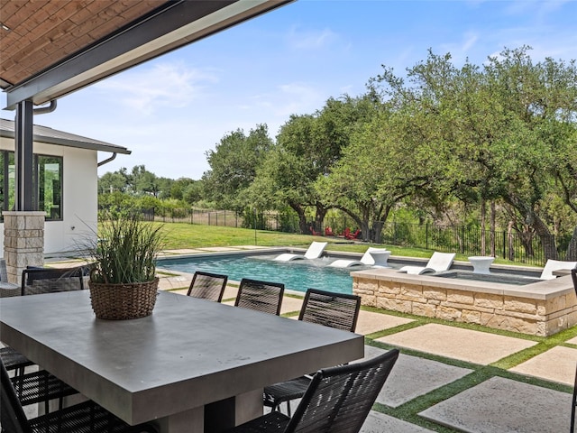 6037 Verandero Ct, Austin, TX 78738 - view of patio / terrace with outdoor dining space and view of wooded area