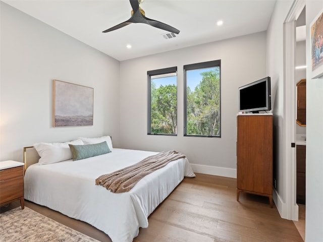 6037 Verandero Ct, Austin, TX 78738 - bedroom with baseboards, recessed lighting, light wood-type flooring, and ceiling fan