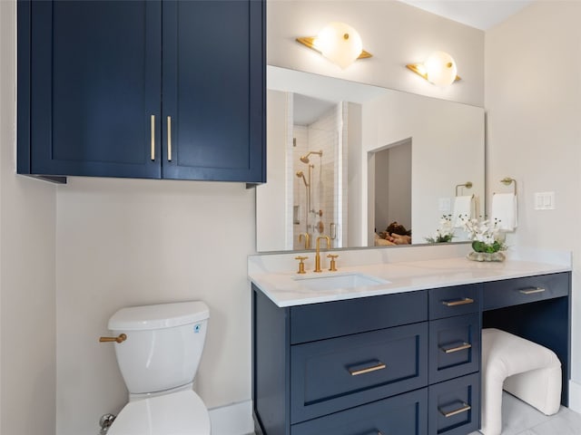 6037 Verandero Ct, Austin, TX 78738 - bathroom featuring vanity, tiled shower, and toilet