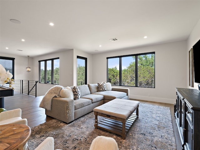 6037 Verandero Ct, Austin, TX 78738 - living area with recessed lighting, wood finished floors, and baseboards