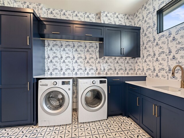 6037 Verandero Ct, Austin, TX 78738 - laundry room featuring cabinet space, wallpapered walls, and washing machine and clothes dryer