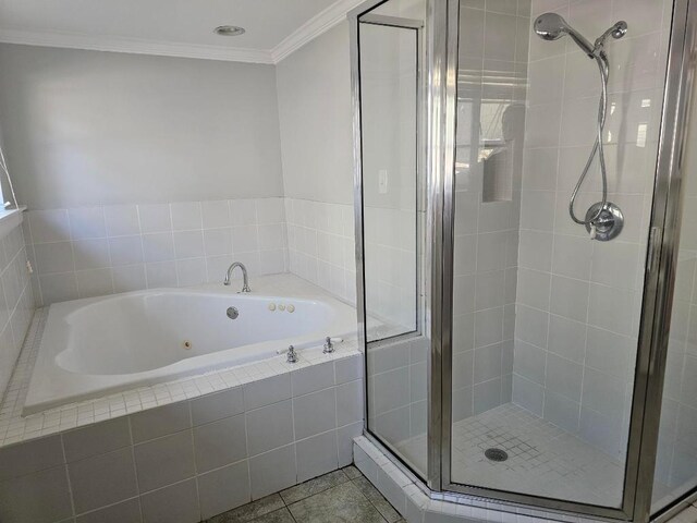 1407 Wilshire Blvd, Austin, TX 78722 - bathroom featuring a shower stall, a whirlpool tub, ornamental molding, and tile patterned flooring