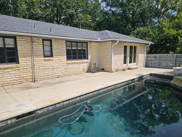 1407 Wilshire Blvd, Austin, TX 78722 - view of pool with a patio and view of scattered trees