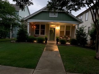 387 Mcgarity, Kyle, TX 78640 - bungalow-style home with a porch and a front lawn