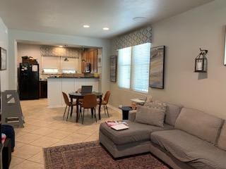 387 Mcgarity, Kyle, TX 78640 - living area featuring light tile patterned flooring and recessed lighting