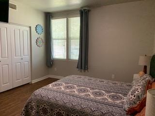 387 Mcgarity, Kyle, TX 78640 - bedroom with wood finished floors and baseboards