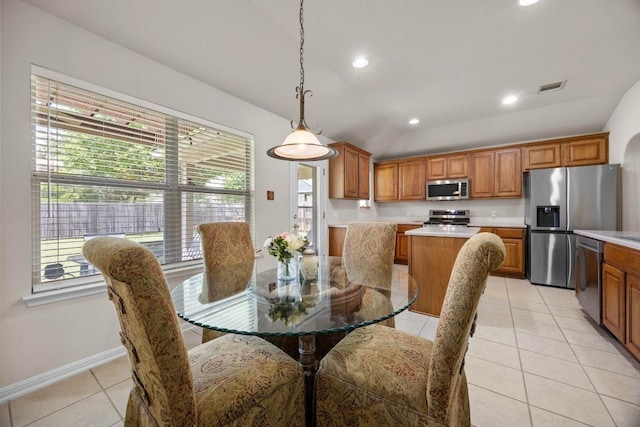2801 Stirrup Cv, Leander, TX 78641 - dining room featuring light tile patterned floors, healthy amount of natural light, recessed lighting, and baseboards