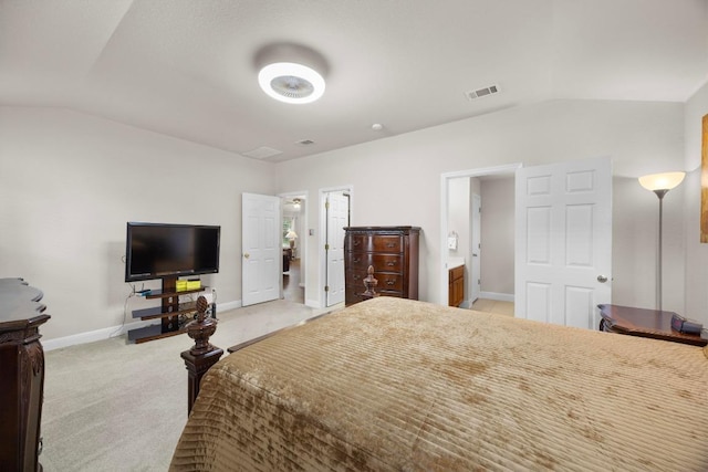2801 Stirrup Cv, Leander, TX 78641 - bedroom with vaulted ceiling, baseboards, and light colored carpet