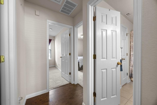 2801 Stirrup Cv, Leander, TX 78641 - corridor with baseboards and light wood-style floors