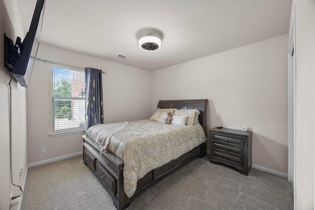 2801 Stirrup Cv, Leander, TX 78641 - bedroom featuring light colored carpet and baseboards
