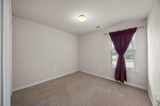 2801 Stirrup Cv, Leander, TX 78641 - carpeted spare room featuring baseboards