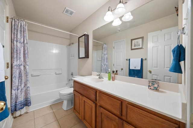 2801 Stirrup Cv, Leander, TX 78641 - bathroom featuring tile patterned flooring, vanity, shower / tub combo, and toilet
