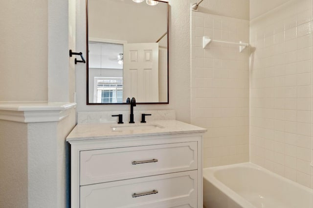 1900 Scofield Ridge Parkway Unit 1703, Austin, TX 78727 - bathroom featuring vanity and shower / bathtub combination