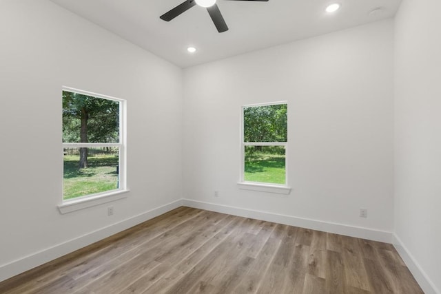 147 Puu Waa Waa Ln, Bastrop, TX 78602 - unfurnished room with light wood finished floors, ceiling fan, and recessed lighting