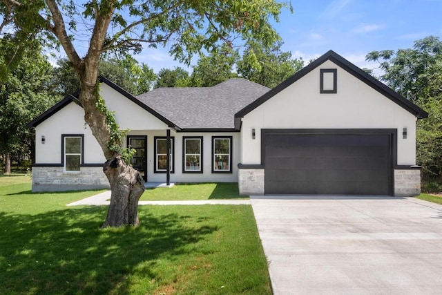 147 Puu Waa Waa Ln, Bastrop, TX 78602 - view of front of home featuring stucco siding, stone siding, an attached garage, and driveway
