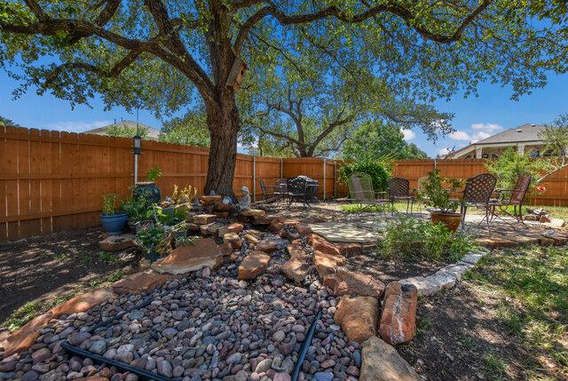 14800 Banbridge Trl, Austin, TX 78717 - fenced backyard with a patio