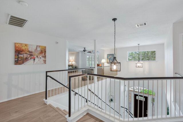 14800 Banbridge Trl, Austin, TX 78717 - corridor featuring an upstairs landing and wood finished floors