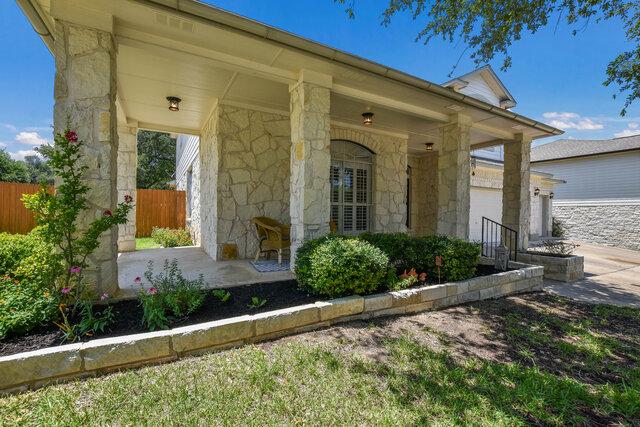 14800 Banbridge Trl, Austin, TX 78717 - doorway to property with stone siding and covered porch