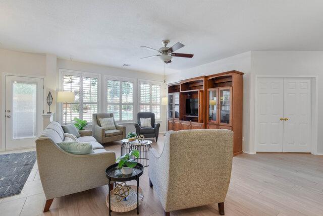 14800 Banbridge Trl, Austin, TX 78717 - living area featuring a ceiling fan and light wood finished floors