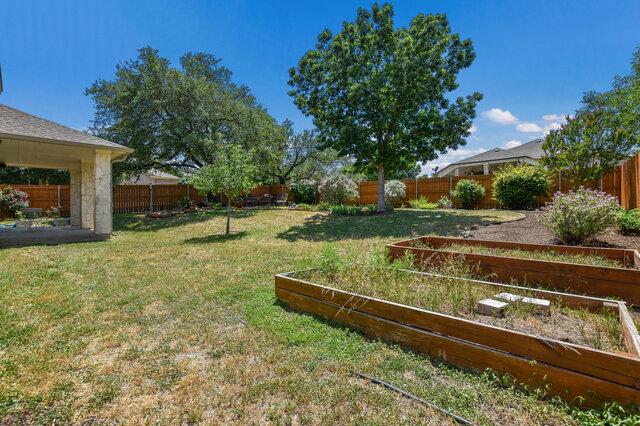 14800 Banbridge Trl, Austin, TX 78717 - view of yard with a vegetable garden