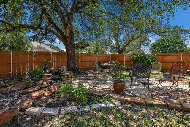 14800 Banbridge Trl, Austin, TX 78717 - fenced backyard with a patio area