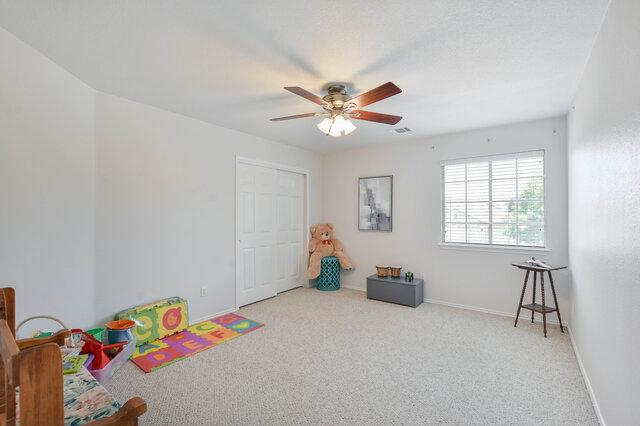 14800 Banbridge Trl, Austin, TX 78717 - rec room with carpet and ceiling fan