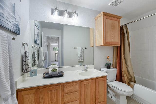 14800 Banbridge Trl, Austin, TX 78717 - bathroom featuring vanity and shower / bath combo