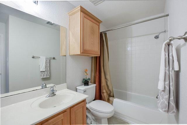 14800 Banbridge Trl, Austin, TX 78717 - bathroom featuring vanity and shower / bath combo with shower curtain