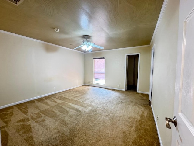 11804 Buckingham Rd, Austin, TX 78759 - spare room with carpet, ornamental molding, ceiling fan, and baseboards