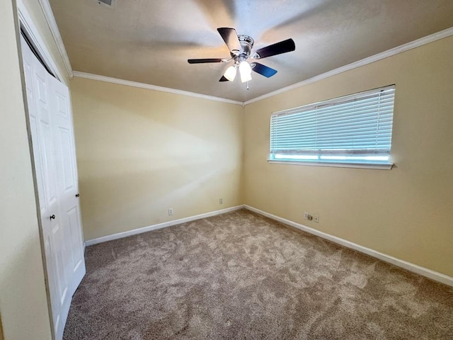 11804 Buckingham Rd, Austin, TX 78759 - unfurnished bedroom featuring carpet flooring, baseboards, crown molding, and a closet