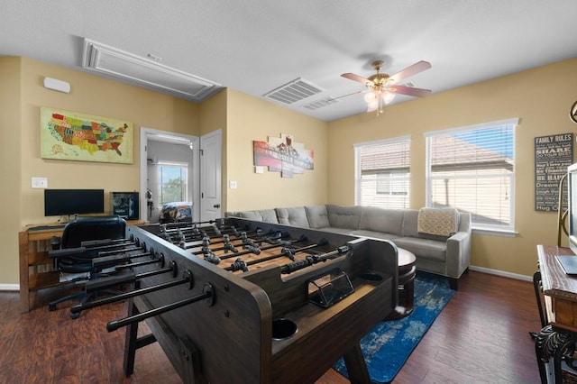 411 Torrington Dr, Austin, TX 78737 - recreation room featuring attic access, ceiling fan, baseboards, wood finished floors, and plenty of natural light