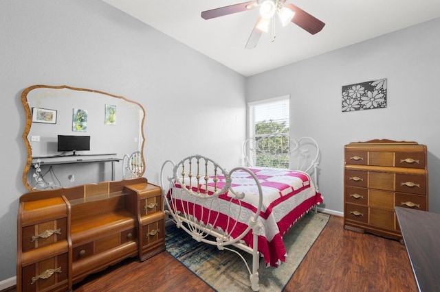 411 Torrington Dr, Austin, TX 78737 - bedroom with dark wood-style floors, lofted ceiling, a ceiling fan, and baseboards