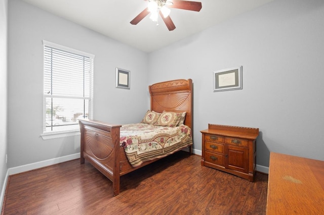 411 Torrington Dr, Austin, TX 78737 - bedroom featuring dark wood-style flooring, baseboards, and a ceiling fan