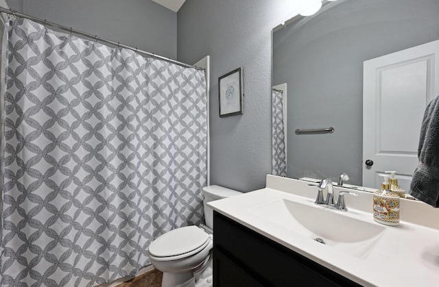 411 Torrington Dr, Austin, TX 78737 - bathroom with a textured wall, vanity, and curtained shower