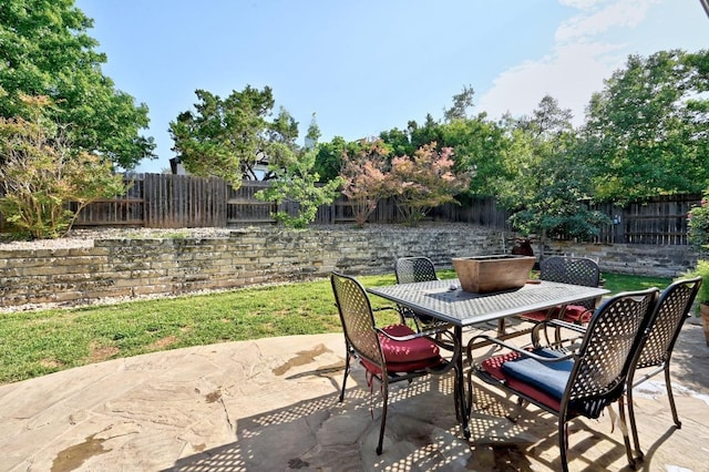411 Torrington Dr, Austin, TX 78737 - fenced backyard with a patio and outdoor dining space
