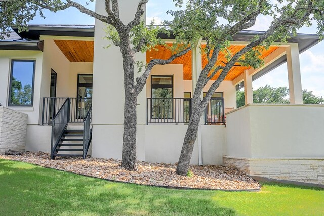 104 Megan Ln, Horseshoe Bay, TX 78657 - view of home's exterior featuring stucco siding