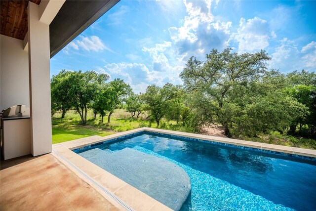 104 Megan Ln, Horseshoe Bay, TX 78657 - outdoor pool with area for grilling